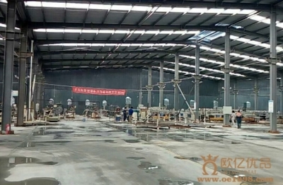 先进设备铸就卓越品质 欧亿优品集成墙饰的混材工艺革新